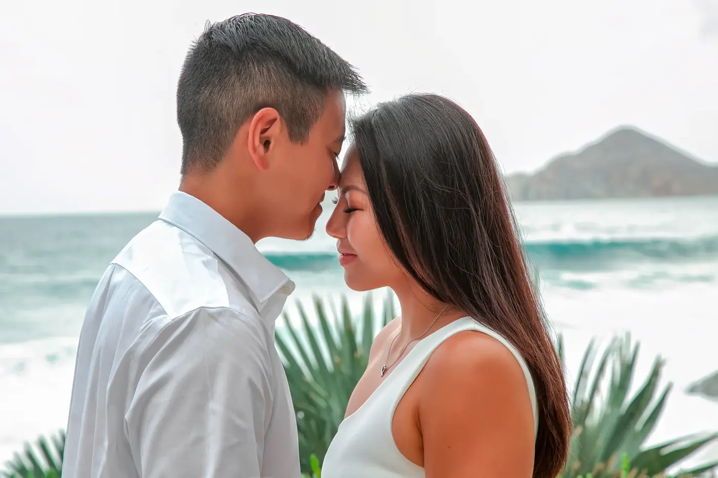 Pareja frente a frente en la playa, Cabo San Lucas